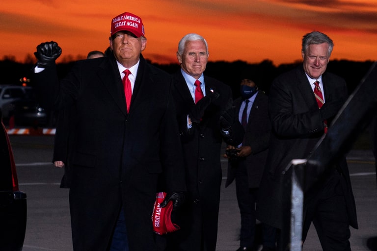 Donald Trump standing beside Mike Pence