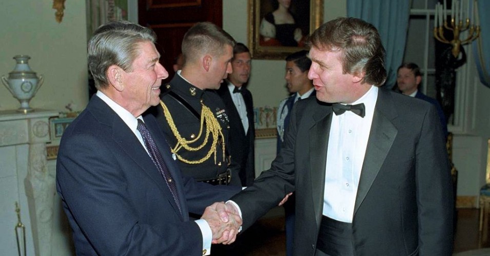 Donald Trump shaking hands with Ronald Reagan 